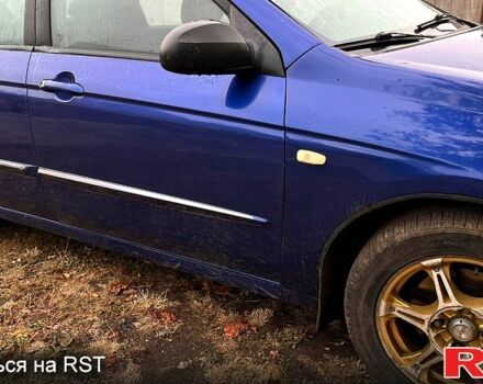 Синий Киа Черато, объемом двигателя 1.6 л и пробегом 230 тыс. км за 3700 $, фото 6 на Automoto.ua