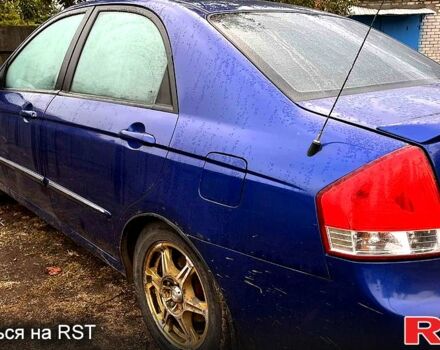 Синий Киа Черато, объемом двигателя 1.6 л и пробегом 230 тыс. км за 3700 $, фото 3 на Automoto.ua