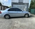 Синий Киа Черато, объемом двигателя 1.6 л и пробегом 270 тыс. км за 3500 $, фото 11 на Automoto.ua