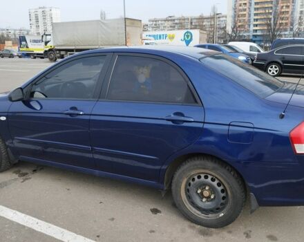 Синий Киа Черато, объемом двигателя 2 л и пробегом 253 тыс. км за 4900 $, фото 1 на Automoto.ua