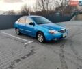 Синий Киа Черато, объемом двигателя 1.59 л и пробегом 185 тыс. км за 3550 $, фото 1 на Automoto.ua