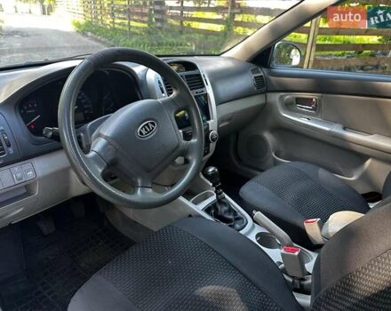 Синій Кіа Черато, об'ємом двигуна 1.6 л та пробігом 248 тис. км за 5990 $, фото 9 на Automoto.ua