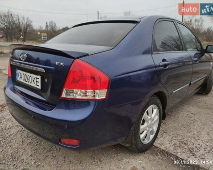 Синий Киа Черато, объемом двигателя 1.98 л и пробегом 246 тыс. км за 4400 $, фото 9 на Automoto.ua