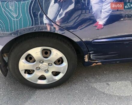 Синий Киа Черато, объемом двигателя 1.6 л и пробегом 292 тыс. км за 4400 $, фото 5 на Automoto.ua