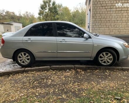 Синій Кіа Черато, об'ємом двигуна 2 л та пробігом 199 тис. км за 5299 $, фото 7 на Automoto.ua