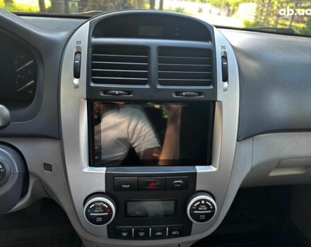 Синий Киа Черато, объемом двигателя 1.6 л и пробегом 248 тыс. км за 5990 $, фото 12 на Automoto.ua