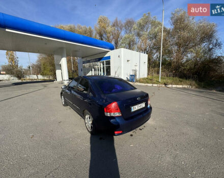Синий Киа Черато, объемом двигателя 1.59 л и пробегом 250 тыс. км за 3100 $, фото 15 на Automoto.ua