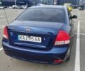 Синий Киа Черато, объемом двигателя 2 л и пробегом 253 тыс. км за 4900 $, фото 2 на Automoto.ua