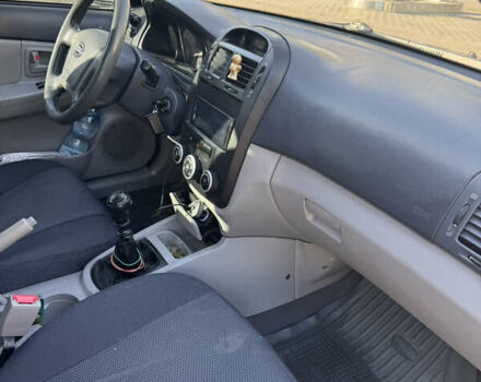 Синий Киа Черато, объемом двигателя 1.59 л и пробегом 250 тыс. км за 3100 $, фото 34 на Automoto.ua