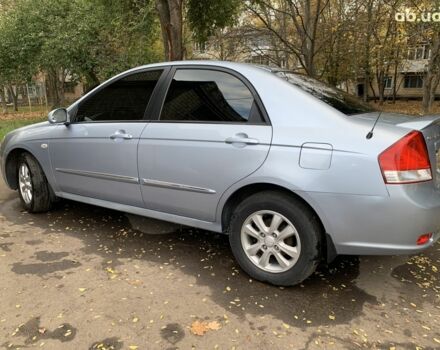 Синій Кіа Черато, об'ємом двигуна 2 л та пробігом 199 тис. км за 5299 $, фото 5 на Automoto.ua
