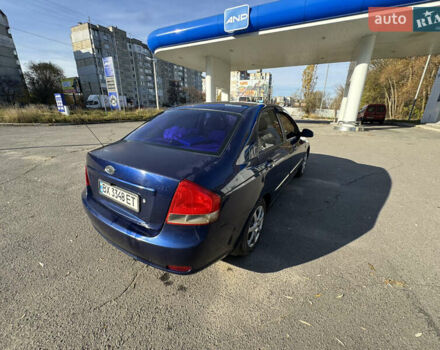 Синий Киа Черато, объемом двигателя 1.59 л и пробегом 250 тыс. км за 3100 $, фото 22 на Automoto.ua