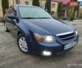 Синий Киа Черато, объемом двигателя 1.98 л и пробегом 246 тыс. км за 4400 $, фото 1 на Automoto.ua