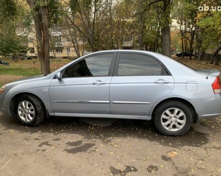 Синій Кіа Черато, об'ємом двигуна 2 л та пробігом 199 тис. км за 5299 $, фото 9 на Automoto.ua