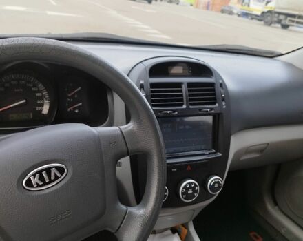 Синий Киа Черато, объемом двигателя 2 л и пробегом 253 тыс. км за 4900 $, фото 7 на Automoto.ua