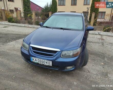 Синий Киа Черато, объемом двигателя 1.98 л и пробегом 246 тыс. км за 4400 $, фото 21 на Automoto.ua