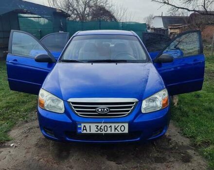 Синий Киа Черато, объемом двигателя 1.6 л и пробегом 297 тыс. км за 3900 $, фото 1 на Automoto.ua