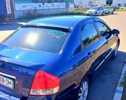 Синій Кіа Черато, об'ємом двигуна 1.6 л та пробігом 205 тис. км за 4500 $, фото 2 на Automoto.ua