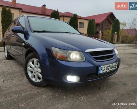 Синий Киа Черато, объемом двигателя 1.98 л и пробегом 246 тыс. км за 4400 $, фото 1 на Automoto.ua