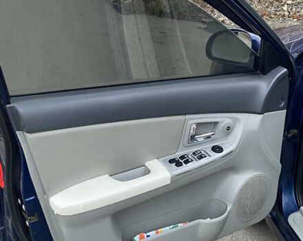 Синій Кіа Черато, об'ємом двигуна 1.59 л та пробігом 303 тис. км за 4400 $, фото 23 на Automoto.ua