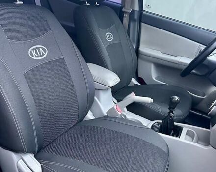 Синий Киа Черато, объемом двигателя 1.6 л и пробегом 125 тыс. км за 5750 $, фото 28 на Automoto.ua