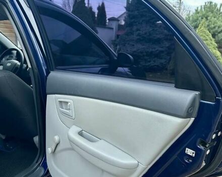 Синий Киа Черато, объемом двигателя 1.6 л и пробегом 125 тыс. км за 5750 $, фото 27 на Automoto.ua