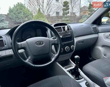 Синий Киа Черато, объемом двигателя 1.6 л и пробегом 125 тыс. км за 5750 $, фото 32 на Automoto.ua