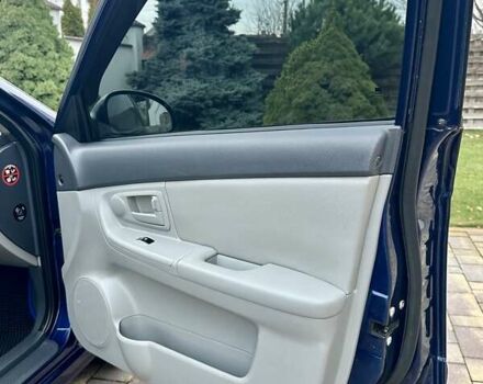 Синий Киа Черато, объемом двигателя 1.6 л и пробегом 125 тыс. км за 5750 $, фото 30 на Automoto.ua