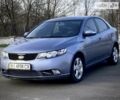 Синій Кіа Черато, об'ємом двигуна 2 л та пробігом 238 тис. км за 5600 $, фото 1 на Automoto.ua