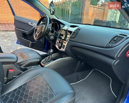 Синий Киа Черато, объемом двигателя 1.59 л и пробегом 140 тыс. км за 9200 $, фото 42 на Automoto.ua