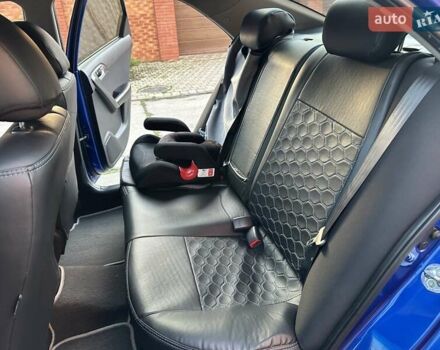 Синий Киа Черато, объемом двигателя 1.59 л и пробегом 140 тыс. км за 9200 $, фото 43 на Automoto.ua