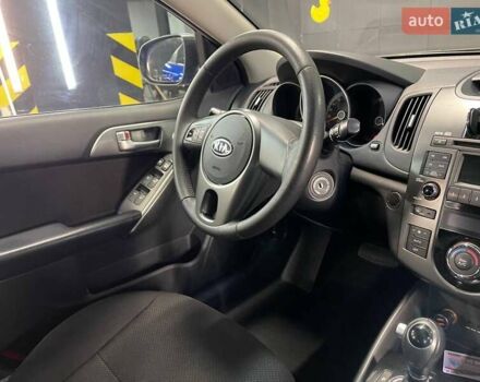 Синий Киа Черато, объемом двигателя 1.6 л и пробегом 160 тыс. км за 8300 $, фото 32 на Automoto.ua