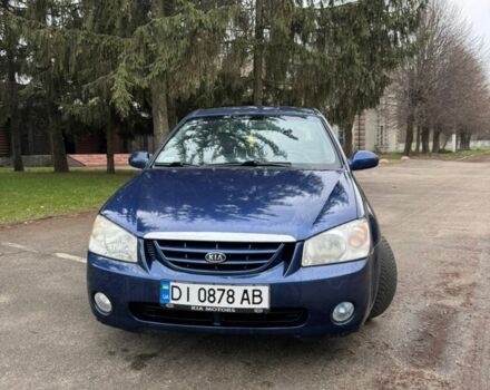 Синий Киа Черато, объемом двигателя 2 л и пробегом 200 тыс. км за 3900 $, фото 1 на Automoto.ua