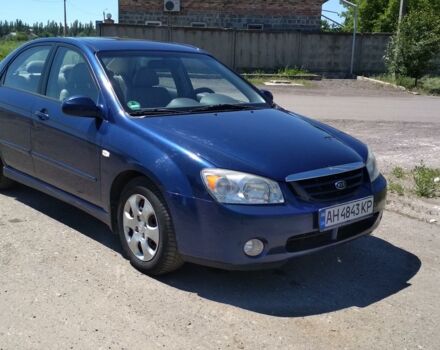 Синий Киа Черато, объемом двигателя 2 л и пробегом 180 тыс. км за 6000 $, фото 1 на Automoto.ua