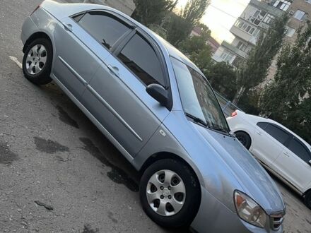Синій Кіа Черато, об'ємом двигуна 1.6 л та пробігом 360 тис. км за 4600 $, фото 1 на Automoto.ua