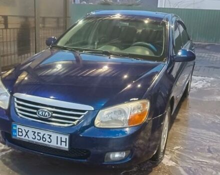 Синий Киа Черато, объемом двигателя 2 л и пробегом 300 тыс. км за 3800 $, фото 1 на Automoto.ua