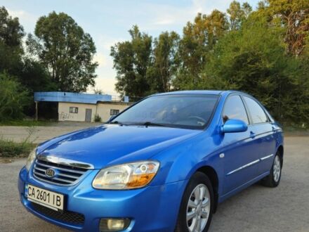 Синій Кіа Черато, об'ємом двигуна 2 л та пробігом 180 тис. км за 4650 $, фото 1 на Automoto.ua
