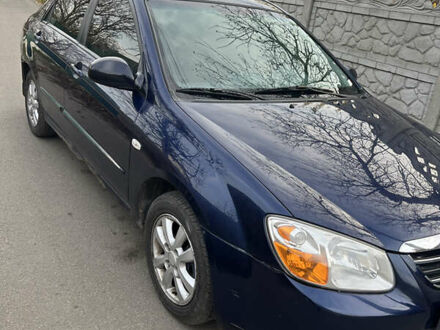 Синий Киа Черато, объемом двигателя 1.6 л и пробегом 170 тыс. км за 3700 $, фото 1 на Automoto.ua