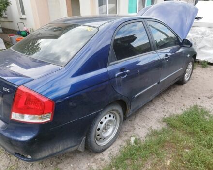 Синий Киа Черато, объемом двигателя 2 л и пробегом 113 тыс. км за 2302 $, фото 1 на Automoto.ua
