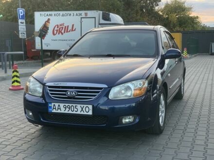 Синий Киа Черато, объемом двигателя 2 л и пробегом 280 тыс. км за 3999 $, фото 1 на Automoto.ua