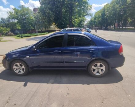 Синий Киа Черато, объемом двигателя 1.6 л и пробегом 251 тыс. км за 5000 $, фото 1 на Automoto.ua