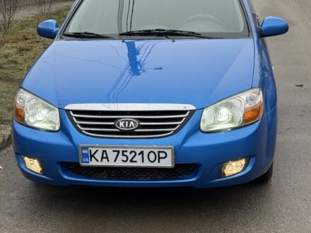 Синий Киа Черато, объемом двигателя 2 л и пробегом 225 тыс. км за 4300 $, фото 1 на Automoto.ua