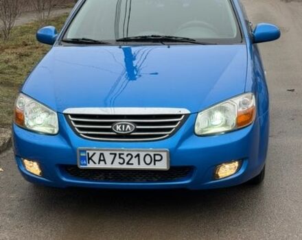 Синий Киа Черато, объемом двигателя 1.98 л и пробегом 225 тыс. км за 3700 $, фото 1 на Automoto.ua