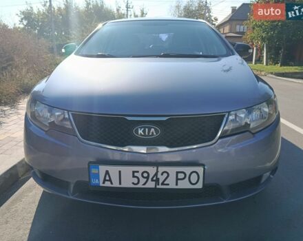 Синий Киа Черато, объемом двигателя 2 л и пробегом 241 тыс. км за 5400 $, фото 1 на Automoto.ua