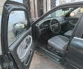 Зеленый Киа Черато, объемом двигателя 2 л и пробегом 300 тыс. км за 1200 $, фото 6 на Automoto.ua