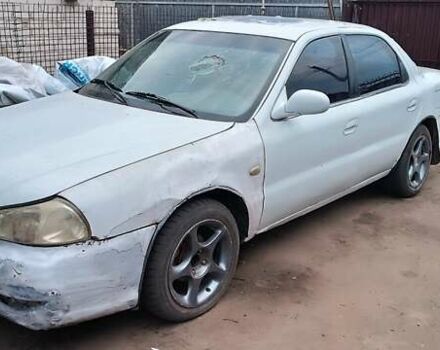 Белый Киа Кларус, объемом двигателя 1.8 л и пробегом 240 тыс. км за 427 $, фото 4 на Automoto.ua