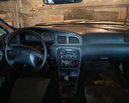 Белый Киа Кларус, объемом двигателя 2 л и пробегом 260 тыс. км за 453 $, фото 4 на Automoto.ua