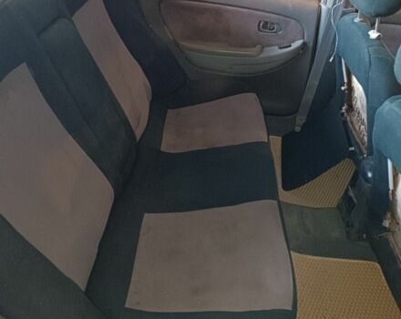 Белый Киа Кларус, объемом двигателя 2 л и пробегом 260 тыс. км за 453 $, фото 3 на Automoto.ua