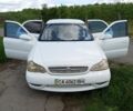 Белый Киа Кларус, объемом двигателя 1.8 л и пробегом 215 тыс. км за 1850 $, фото 1 на Automoto.ua