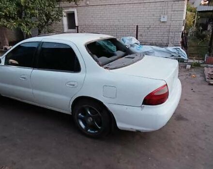 Белый Киа Кларус, объемом двигателя 1.8 л и пробегом 240 тыс. км за 427 $, фото 1 на Automoto.ua