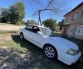 Белый Киа Кларус, объемом двигателя 2 л и пробегом 190 тыс. км за 449 $, фото 1 на Automoto.ua